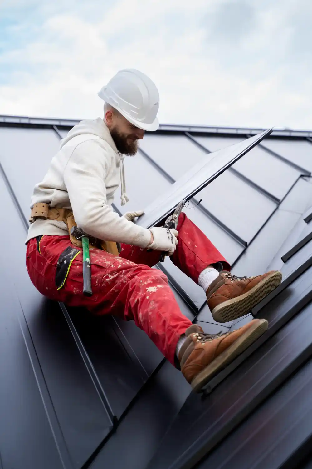 Experienced roofer detecting and repairing roof leak on residential property in Bowling Green KY.