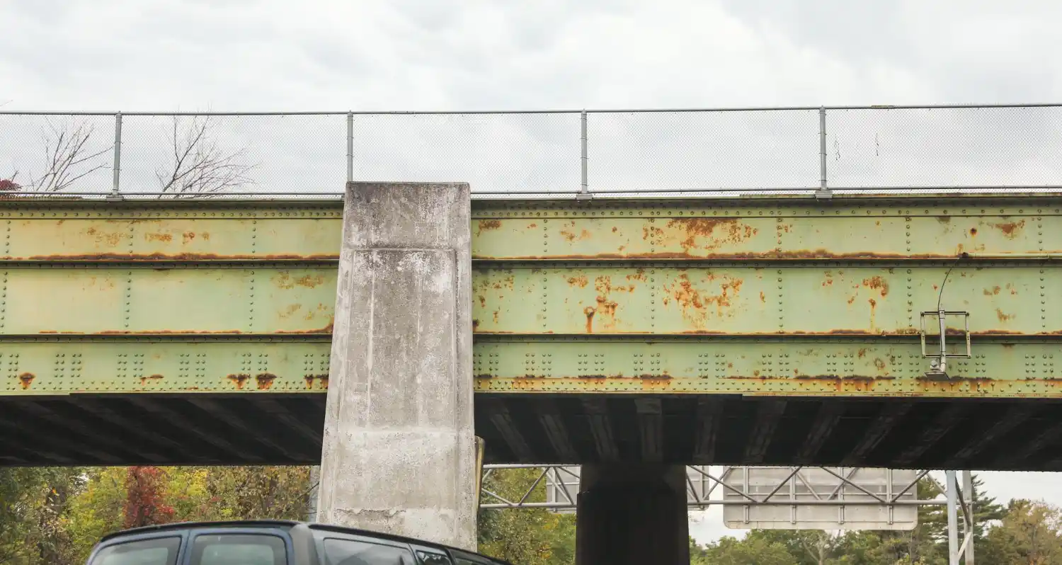 Rusted metal gutter system requiring replacement and maintenance